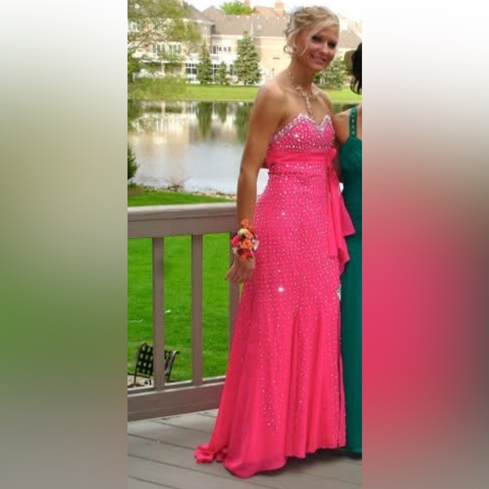 Hot pink with sparkles strapless prom dress. Size small